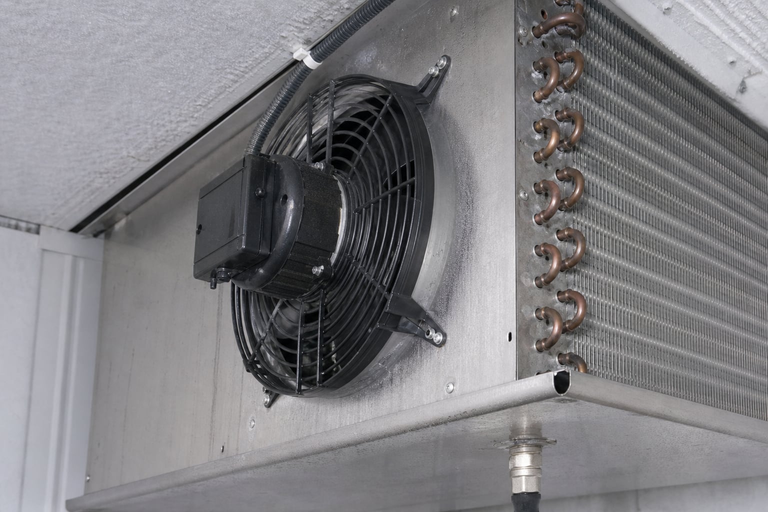 Evaporator coil and fan detail inside the hotel cold room
